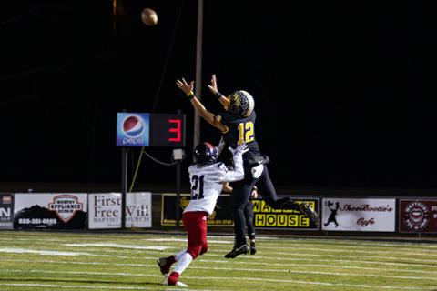 Grayson Hall goes airborne to bring down a catch in Murphy’s game against Starmount in the fourth round of the state 2A playoffs Friday night.