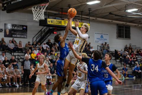 Grayson Hall of Murphy goes up for a shot against Hiwassee Dam on Dec. 18.