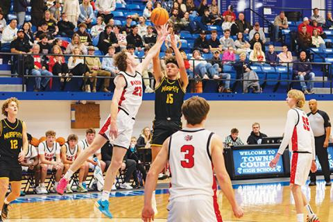 Cannon Crompton/sports@cherokeescout.com Abram Twiggs (No. 15) of Murphy shoots a 3-pointer against Rabun County, Ga., on Dec. 29, 2025.