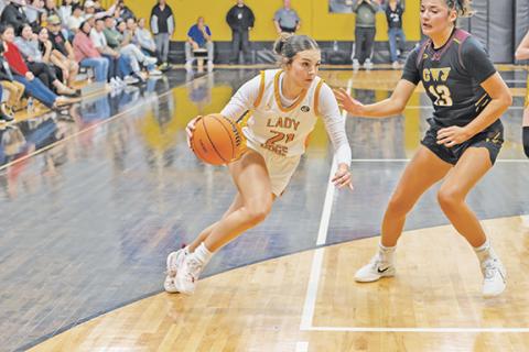 Cannon Crompton/sports@cherokeescout.com Ella Howard of Murphy drives to the basket against Cherokee on Dec. 19, 2025.