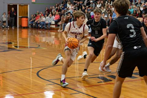 Gabe Clark of Andrews drives down the court against Franklin on Jan. 21.
