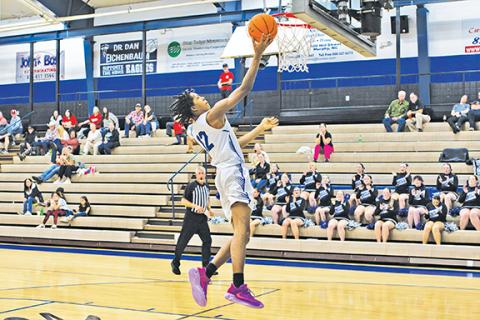 Cannon Crompton/sports@cherokeescout.com Xavier Johnson goes up for a layup on a fast break against Copper Basin, Tenn., on Nov. 18, 2025.