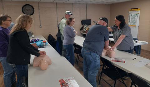 Photos by Anngee Quinones-Belian/Staff Correspondent  A first-aAid and CPR class was taught on Jan. 1 by registered nurse Amy Nelson at the N.C. Cooperative Extension building in Murphy. Nelson is with the N.C. Agromedicine Institute. About 20 people attended, each appearing interested in learning how to help save a life in an emergency situation. The agenda also included discussions about different types of farming equipment and accidents as well as how to avoid them, but how to treat if an accident does o