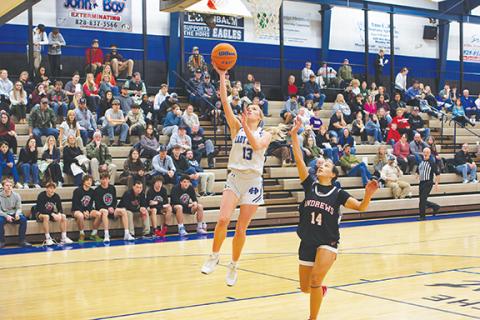 Cannon Crompton/sports@cherokeescout.com Brooklyn Orton of Hiwassee Dam goes up for a layup against Andrews on Friday. 