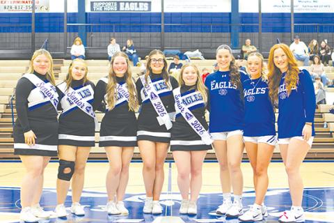 Photos by Cannon Crompton/sports@cherokeescout.com Before their games on Feb. 10, the Hiwassee Dam boys and girls varsity basketball seniors were honored along with senior cheerleaders. Left: Hiwassee Dam senior cheerleaders (from left) Jackie McGovern, Natalie Ashe, Ava Pressley, Abby Lee and Kalli Hagelin, as well as senior girls basketball players Brinkley Payne, Brooklyn Orton and Peyton Williamson were honored. Right: Hiwassee Dam varsity boys basketball players (from left) Jimmy Kelly, Dalton Kester, 