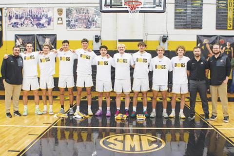 Cannon Crompton/sports@cherokeescout.com Murphy High School honored its senior boys basketball players on Feb. 4. From left are assistant coach Michael Kernea, Camden Breazeale, Kyle Luke, Elijah Twiggs, Abram Twiggs, McKinnley Dockery, Aaron Harger, Cale Harger, Ryan Payne, Tyler Payne, head coach Heath Curtis and assistant coach Cody Allen. 