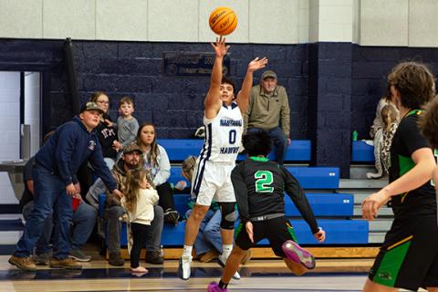 Cannon Crompton/sports@cherokeescout.com Fernando Trejo of Nantahala shoots a 3-pointer against Blue Ridge Early College on Jan. 29. 