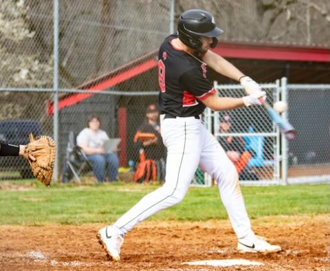 Brady McLelland of Andrews makes contact against Rosman on March 10.
