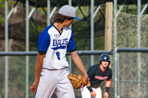 Cannon Crompton/sports@cherokeescout.com Hiwassee Dam pitcher Elijah Cole keeps an eye on Ethan Sutton of Andrews as he leads off on first base on March 24. 