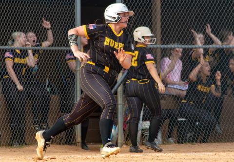 Paisley Johnson of Murphy rounds first base after getting a hit against Hiwassee Dam on March 20. 