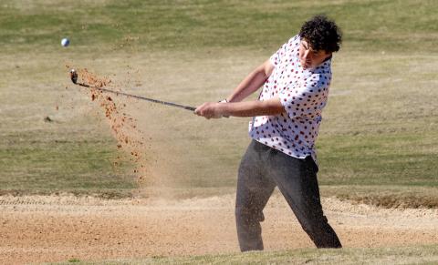 Brady Queen of Andrews hits it out of a bunker at Mountain Harbour Golf Club in Hayesville on Thursday.