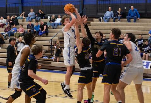 Little Smoky Mountain Conference Player of the Year Jonah Dockery takes a shot against Highlands on Feb. 19. 