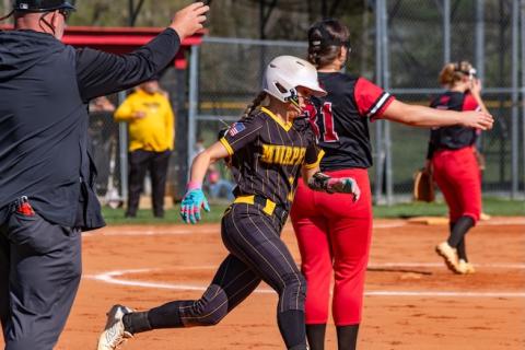 Emma Hensley rounds first base and heads for second against Andrews last season on April 15, 2025. 