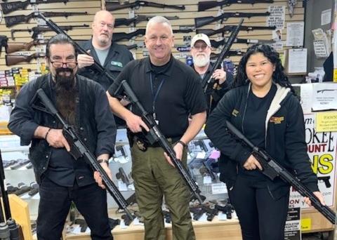 Riflemen: The Cherokee County Sheriff’s Office has received a donation of AR-15 rifles from Cherokee Guns in Murphy and owner Doc Wacholz (left).