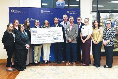 Federal funding: From left are Laura Springer, Ashley Bicknell, Teresa Bowleg, Richelle Phillips, Erlanger President & CEO Jim Coleman, Erlanger Western North Carolina Market President and CEO of Outreach Erlanger Stephanie Boynton, U.S. Rep. Chuck Edwards, Dr. Gary Roper, Wesley Phillips, Murphy Mayor Tim Radford, Cherokee County Chamber of Commerce Executive Director Victoria Ivie, Miranda Shuler and Shilene Chastain.