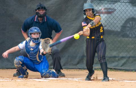 Ilie Smith of Murphy gets a hit against Hiwassee Dam on March 20.