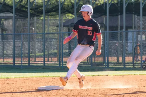 Dawson Stalcup of Andrews makes it to second base safely against Murphy on Friday.