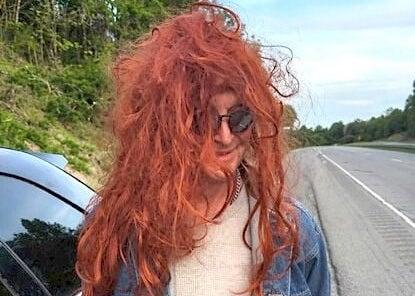 Tracy Lee Mason is shown wearing a wig following his arrest by Cherokee County sheriff's deputies.