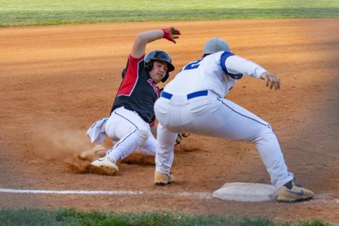 Drew Dartez of Andrews slides into third base trying to avoid a Hiwassee Dam tag on March 24. Cannon Crompton/sports@cherokeescout.com