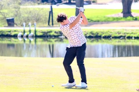 Brady Queen of Andrews hits his approach shot at Mountain Harbour Golf Club in Hayesville on March 19.