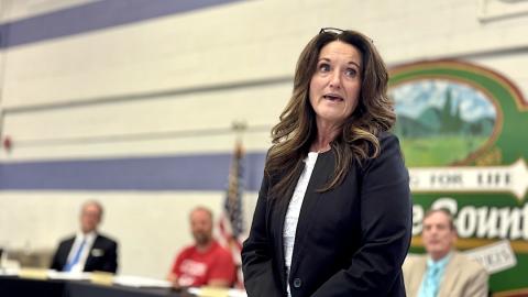 Angel Owens delivers remarks to the audience after accepting an appointment to be Cherokee County Schools' next superintendent.