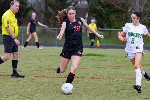 Kimber Vaught of Andrews was named Smoky Mountain Conference All-Conference. Pictured is Vaught kicking the ball downfield against Blue Ridge Early College on March 10.