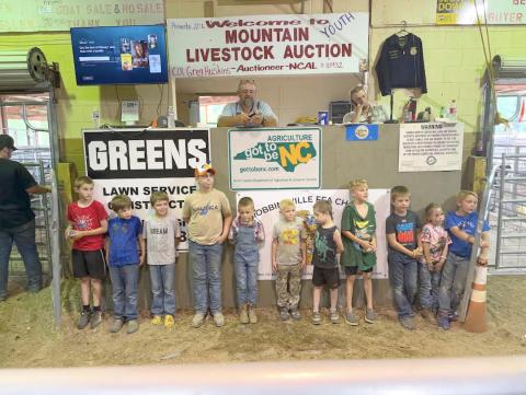 Mountain Youth Livestock Market is run by the cowboys for the cowboys. Photo by Aiden McCoy Williams/Cherokee Scout