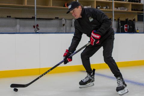 The Sticks Ice Arena owner Don Whalen skates and stick handles with the puck. Photo by Cannon Crompton/sports@cherokeescout.com