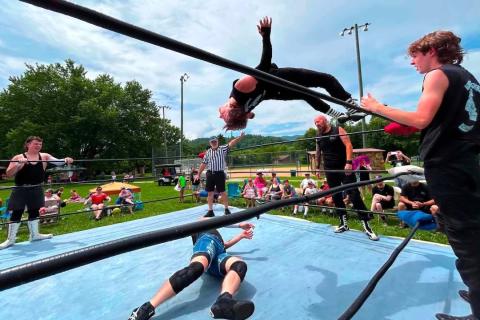 Vinnie of The Family – the ACWF tag team champions – flips off the top rope at ACWF FreedomMania 250 in Andrews on July 4. Photos by Cindy Ray, Ashley Graves and Angie Hogan