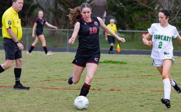 Kimber Vaught of Andrews was named Smoky Mountain Conference All-Conference. Pictured is Vaught kicking the ball downfield against Blue Ridge Early College on March 10.