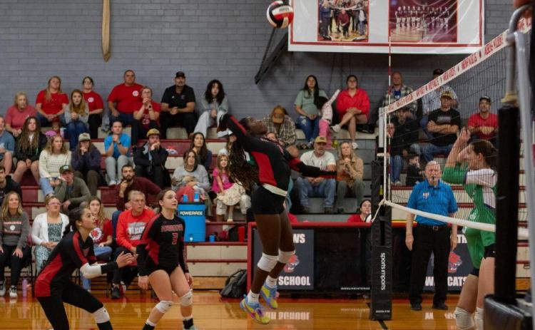 Juliet Holloway of Andrews goes up for a kill against the N.C. School of Science of Math on Oct. 21, 2025 in the second round of the 1A state playoffs.