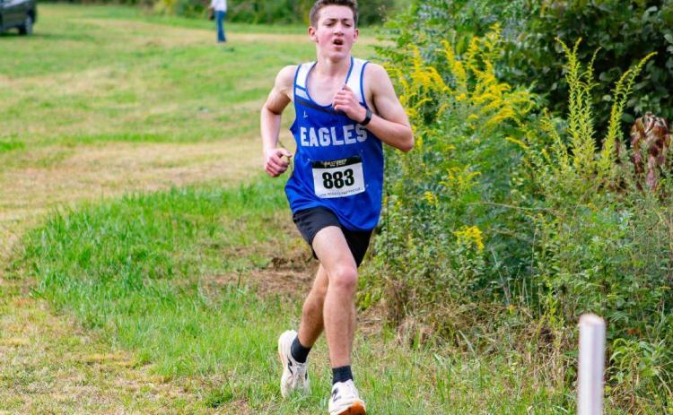 Maverick Hawley of Hiwassee Dam runs in his home cross-country meet on Sept. 24, 2025.