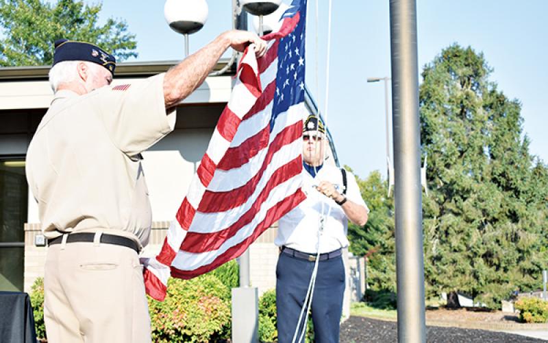 American Legion Posts 96 and 532 raised the flag to half staff on Patriot Day at Tri-County Community College.