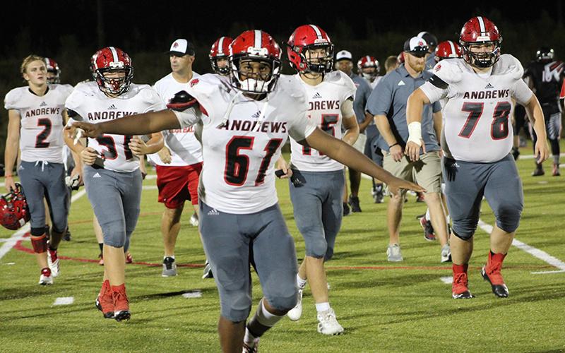 Makhi Smith (61) celebrates Andrews’ win over the North Georgia Falcons. Photo by Mary White