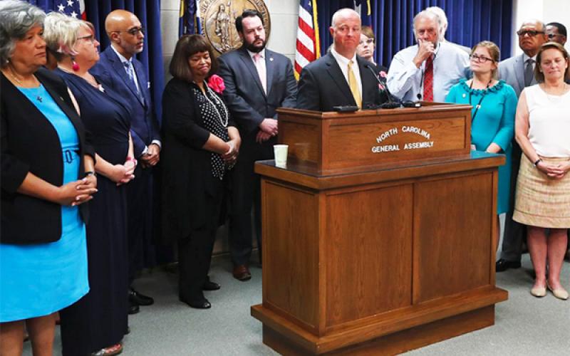 Rep. Darren Jackson, House Democratic Leader, speaks during a news conference with other Democratic House members Wednesday, Sept. 11, 2019. AP photo