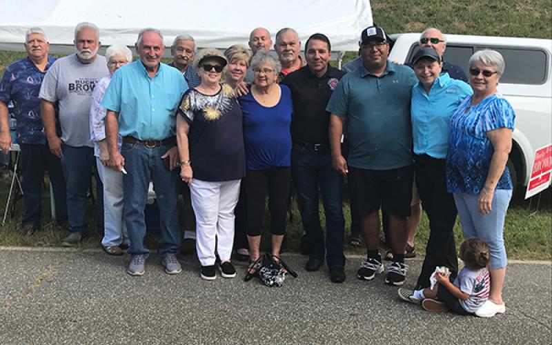Principal Chief Richard Sneed (fifth from right, black polo shirt) visited with well-wishers in Cherokee County on Election Day for the Eastern Band of Cherokee Indians on Thursday in Marble.