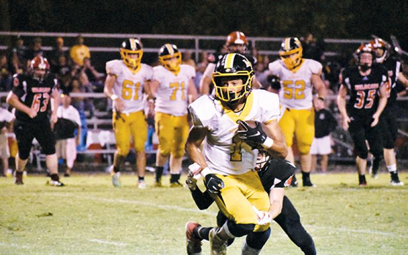 Murphy’s Abram Abling turns upfield after making a catch Friday night against Andrews. The Bulldogs ran away for the victory.