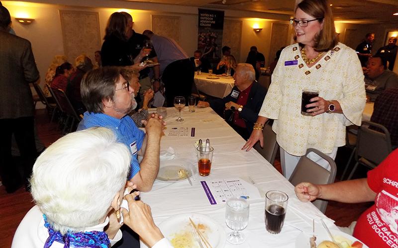 Western Carolina University Chancellor Kelli Brown was welcomed by Cherokee County alumni and community members on Oct. 8 at ShoeBooties Café in downtown Murphy. Brown is speaking to Tom O’Brien of Andrews and Marion Forsyth of Murphy. Photo by Stacy Van Buskirk