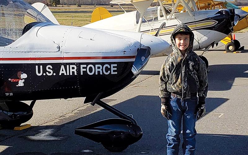 Timothy Raxter, 7, of Murphy, enjoyed seeing all the military planes at Western Carolina Regional Airport in Andrews on Saturday. Photo by Crissy Raxter/Contributing Photographer
