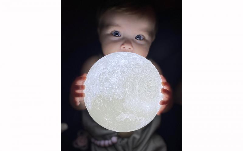 Aria Jade has never taken a bad photograph, including this one on Christmas Day while playing with the glowing moon ball she just opened.