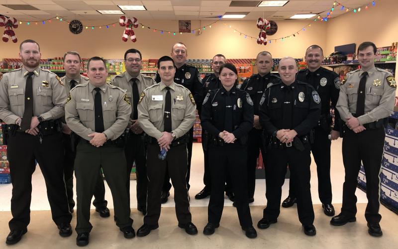 Local law enforcement officers joined forces to help children during Shop with a Cop in December.