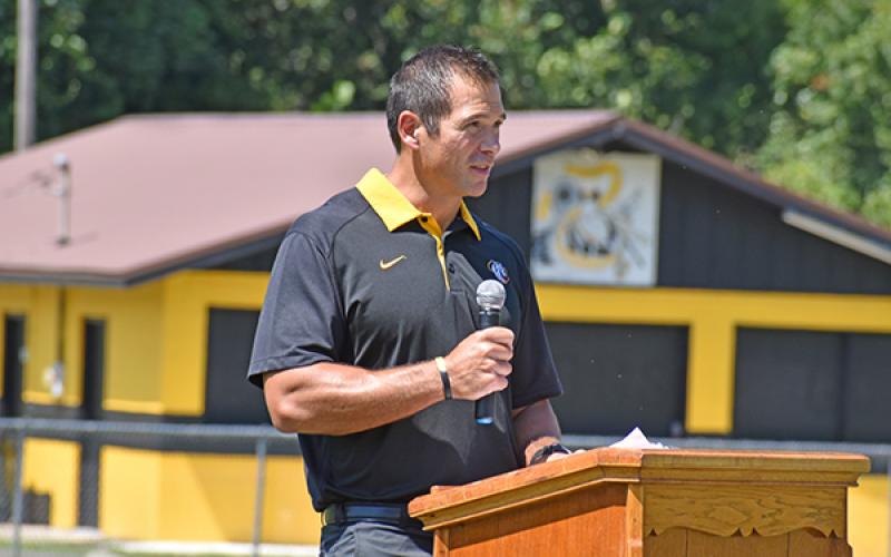 Lady Bulldog head coach Ray Gutierrez speaks to his players and their families during Sunday’s ring ceremony. 