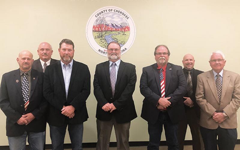 Penny Ray/pennyray@cherokeescout.com Front row (from left) are Cherokee County Commissioners Dan Eichenbaum, Gary “Hippie” Westmoreland, Roy Dickey, C.B. McKinnon and Cal Stiles. Back row (from left) are county attorney Darryl Brown and County Manager Randy Wiggins.