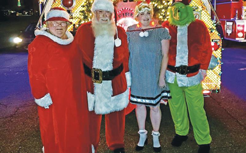 Santa and Mrs. Claus got to spend quality time with Cindy Lou Who and the Grinch after the Andrews Chamber of Commerce’s annual Magic on Main Electric Christmas Parade. Photo provided by the Andrews Chamber of Commerce