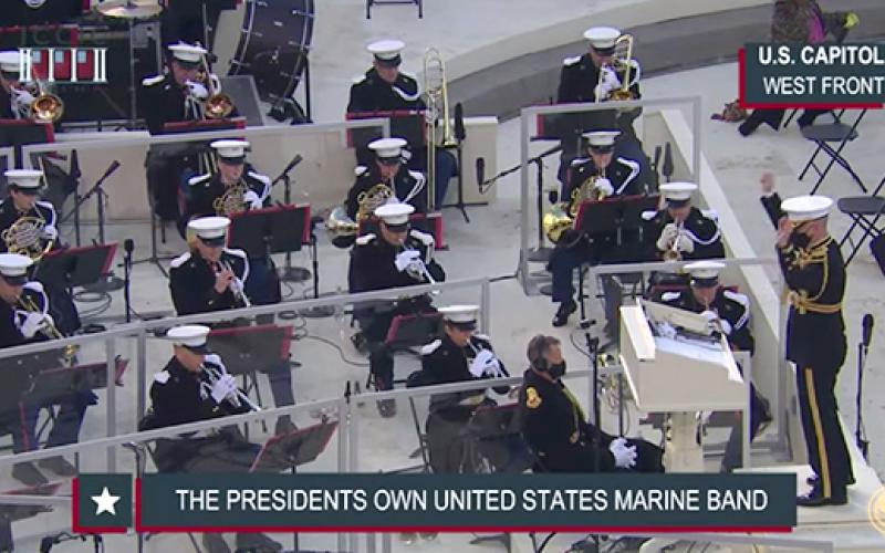 As seen in the video streamed for the event, “The President’s Own” U.S. Marine Band performs Dr. Kimberly Archer’s “Fanfare Politeia” during the prelude of the 59th Presidential Inauguration.
