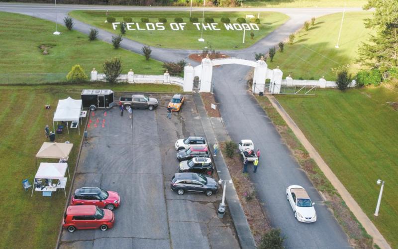 An overhead view of the Tri-state MINIs Group Poker Run on Saturday at Fields of the Wood.