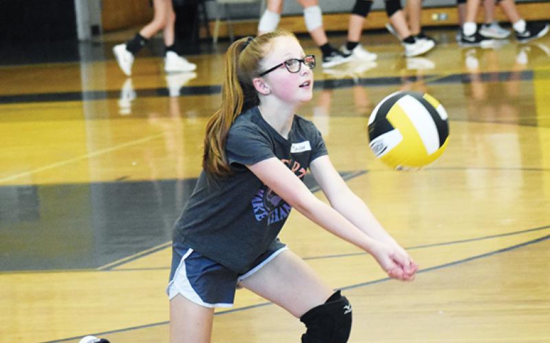Justin Fitzgerald/sports@cherokeescout.com A total of 52 girls entering grades 3-8 next school year attended Murphy’s youth volleyball camp on May 31 and June 1. At the end of the camp, all participants were given a T-shirt and volleyball. Above, Taylor Helton goes all-out for the ball.