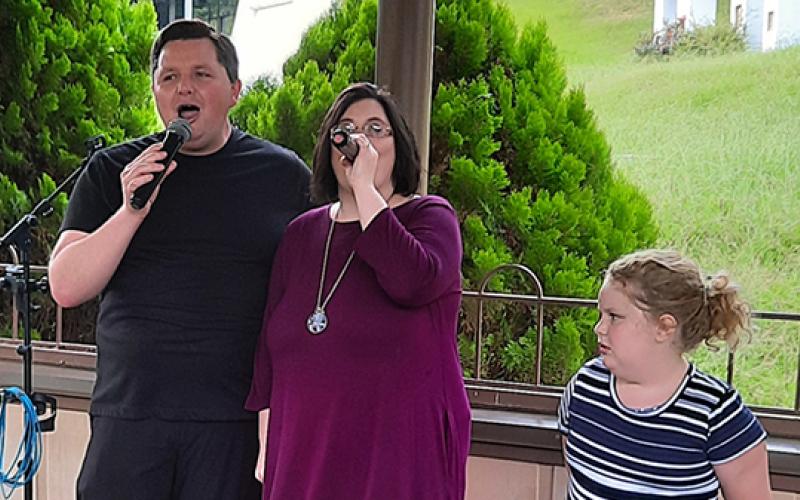 Photos by Anngee Quinones-Belian/Staff Correspondent  Faithful Promise Ministries was one of the gospel groups singing at Fields of the Wood.