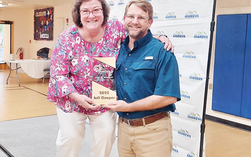Andrews chamber President Gayle Horton presents the El-Khouri Volunteer of the Year award for 2022 to Jeff Cooper for all the hours he has spent helping the chamber and town with  different projects.