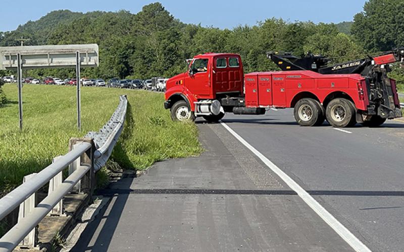 Photos by Randy Foster/editor@cherokeescout.com: Eastbound traffic was totally blocked for 15 minutes on U.S. 19/74.